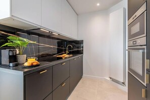Fridge, microwave, dishwasher, coffee/tea maker