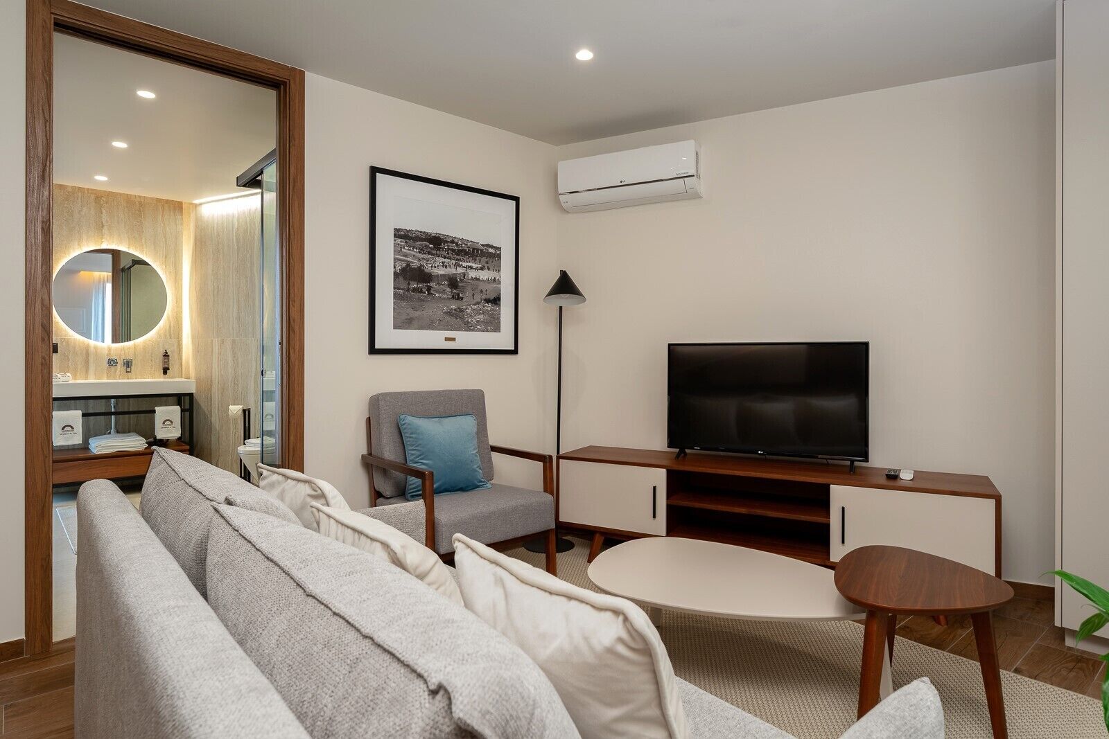 Superior Apartment, Balcony | Living area | 80-cm LED TV with cable channels