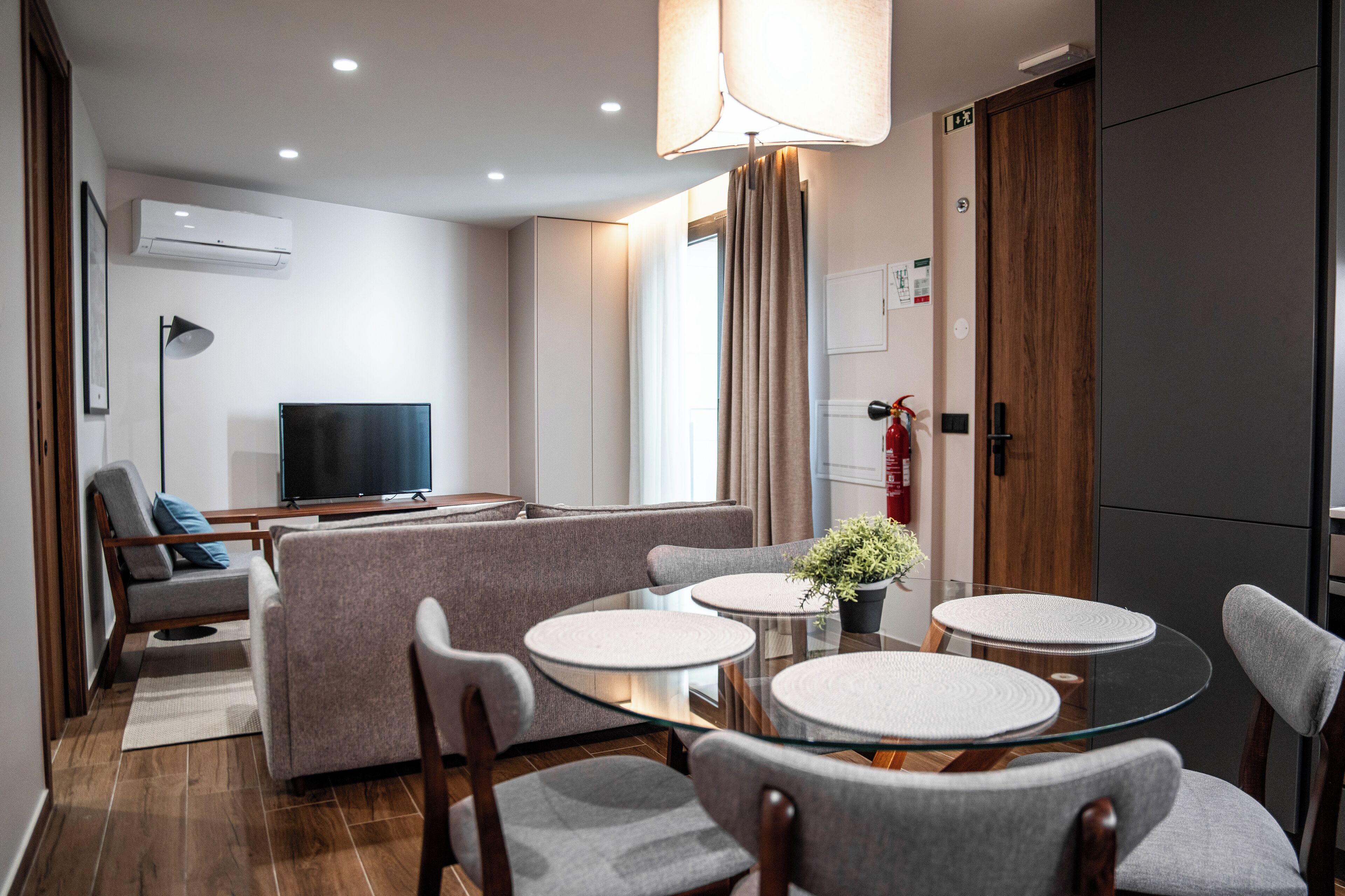 Superior Apartment, Balcony | Living area | 80-cm LED TV with cable channels