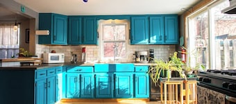 Walkable two bedroom with large fenced yard and gardens.