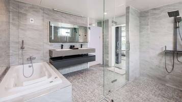Shower, hair dryer, towels, shampoo