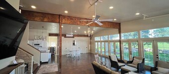 Red Roof Farmhouse • large gathering space • sleeps 27+ • hot tub • treehouse