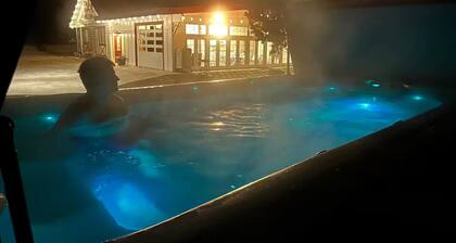 Charming country cottage has private patio, hot tub & many other amenities.