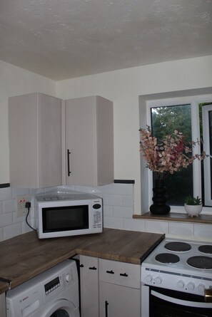 Refrigerador, microondas, horno, placa de cocina