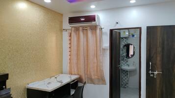 Shower, towels, soap, toilet paper