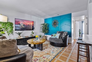 Appart'hôtel, plusieurs lits, patio, vue jardin (Avenue 48) | Coin séjour