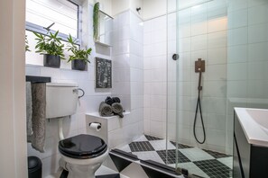 Shower, hair dryer, towels, soap