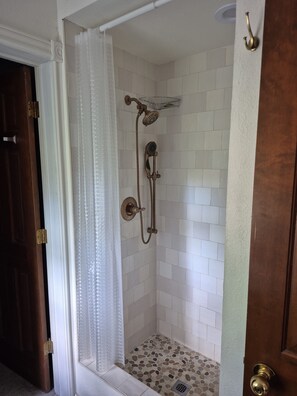 Shower, towels, soap, toilet paper