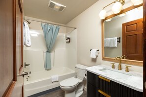 Hair dryer, towels, soap, shampoo