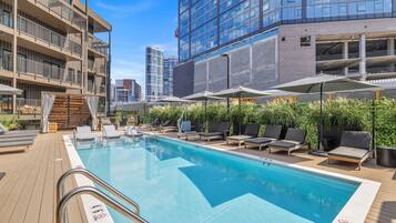Seasonal outdoor pool, open 10:00 AM to 10:00 PM, free cabanas