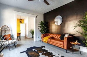 Exclusive Apartment, Pets Allowed | Living area | 32-inch Smart TV with digital channels, Netflix, Hulu