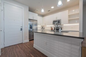 Fridge, dining tables - Landing | Incredible 2BD, Pool, Yoga Studio (San Antonio)