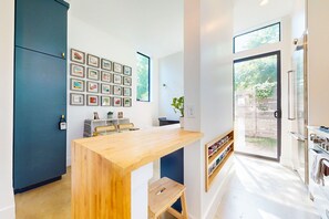 Fridge, microwave, oven, stovetop - Modern two story home with kitchen, gated yard, balcony, close to South Congress (Austin)