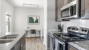 Fridge, dining tables - Landing | Stylish 1BD, Pool, Gym (Dallas)