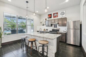 Fridge, dining tables - Landing | Chic 1BD, Pool, Gym (Dallas)