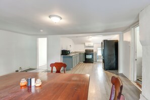 Fridge, stovetop, dishwasher, coffee/tea maker