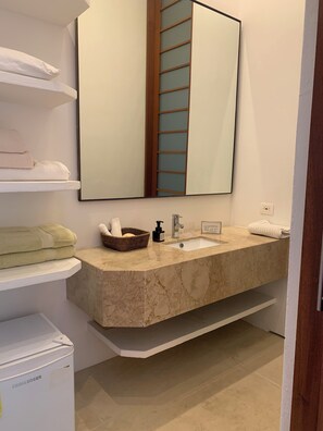 Shower, hair dryer, towels, toilet paper