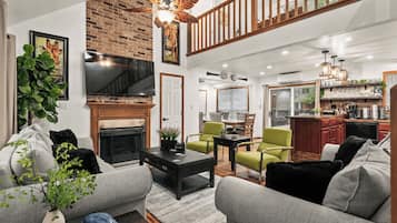 House (5 Bedrooms) | Living area | TV, fireplace, video-game console, foosball