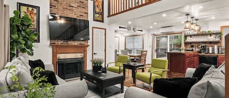 House (5 Bedrooms) | Living area | TV, fireplace, video-game console, foosball