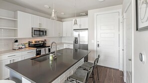 Fridge, dining tables - Landing at La Tierna - 2 Bedrooms in Northwest ... (San Antonio)