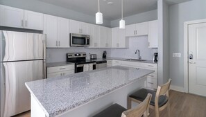 Fridge, dining tables, kitchen islands - Landing | Stunning 1BD, Clubhouse, Game Room (Conroe)