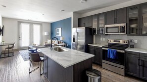 Fridge, dining tables - Landing | Modern 1BD, Gym, Courtyard (Denton)