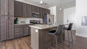 Private kitchen - Landing | Stunning 1BD, Game Room, Gym (San Antonio)