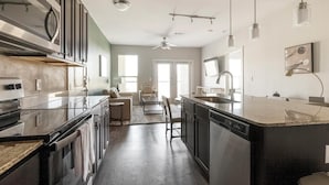 Fridge, dining tables - Landing | Chic 1BD, Gym, Pool (New Braunfels)