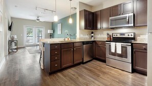 Fridge, dining tables - Landing | Beautiful 1BD, Game Room, Gym (New Braunfels)