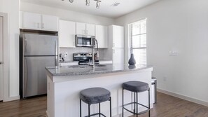 Fridge, dining tables - Landing | Spectacular 3BD, Gym, Pool (Waller)