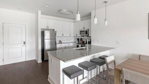 Fridge, dining tables - Landing | Beautiful 2BD, Pool, Gym (Athens)