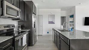 Fridge, dining tables - Landing | Stunning 2BD, Pool, Gym (Austin)