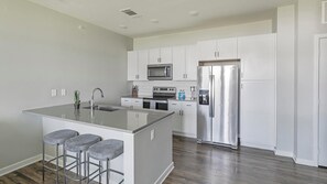 Fridge, dining tables - Landing | Stunning 1BD, Pool, Gym (Madison)