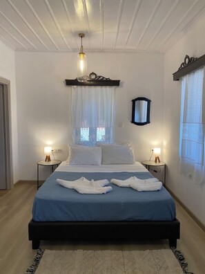 2 chambres, coffres-forts dans les chambres, fer et planche Ă repasser