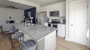 Fridge, dining tables - Landing | Spectacular 3BD, Gym, Yoga Studio (Summerville)