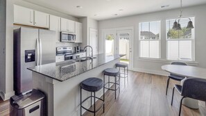 Fridge, dining tables - Landing | Spectacular 3BD, Gym, Yoga Studio (Summerville)