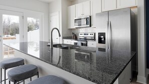 Fridge, dining tables - Landing | Modern 3BD, Gym, Yoga Studio (Summerville)