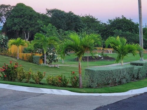 Spacious two bedroom home with ocean view, pool and tennis court.