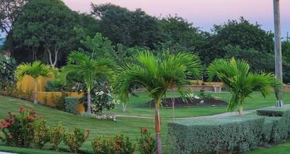 Spacious two bedroom home with ocean view, pool and tennis court.