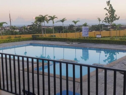 Spacious two bedroom home with ocean view, pool and tennis court.