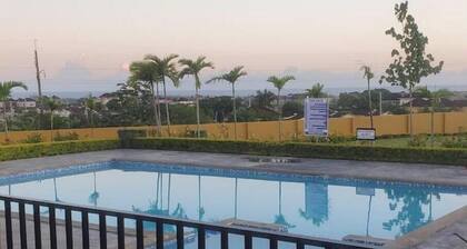 Spacious two bedroom home with ocean view, pool and tennis court.