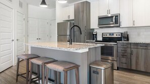 Fridge, dining tables - Landing | Incredible 1BD, Rooftop Lounge (Smyrna)