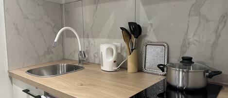 Fridge, microwave, coffee/tea maker, electric kettle