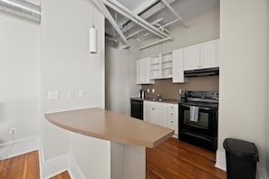 Fridge, dining tables - Landing | Modern 1BD, Gym (Nashville)