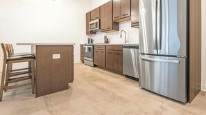 Fridge, dining tables - Landing | Stylish 1BD, Rooftop Lounge, Gym (St. Louis)