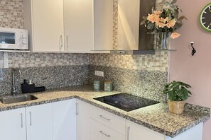 Fridge, microwave, coffee/tea maker, toaster