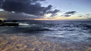 A coastal scene with rough sea waves and a bridge structure. - 2 Manolo Pris Studio Private Terrace (El Pris)