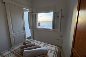 1 bedroom, iron/ironing board, travel crib, bed sheets