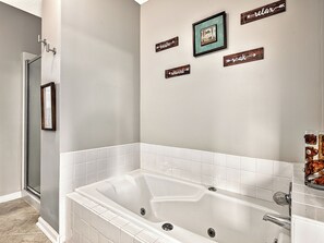 Jetted bath, hair dryer, towels, soap