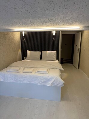 1 slaapkamer, een strijkplank/strijkijzer, wifi